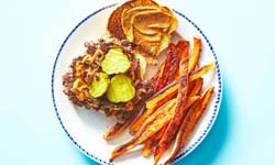 Chipotle Burger with Pickles and Sweet Potato Wedges